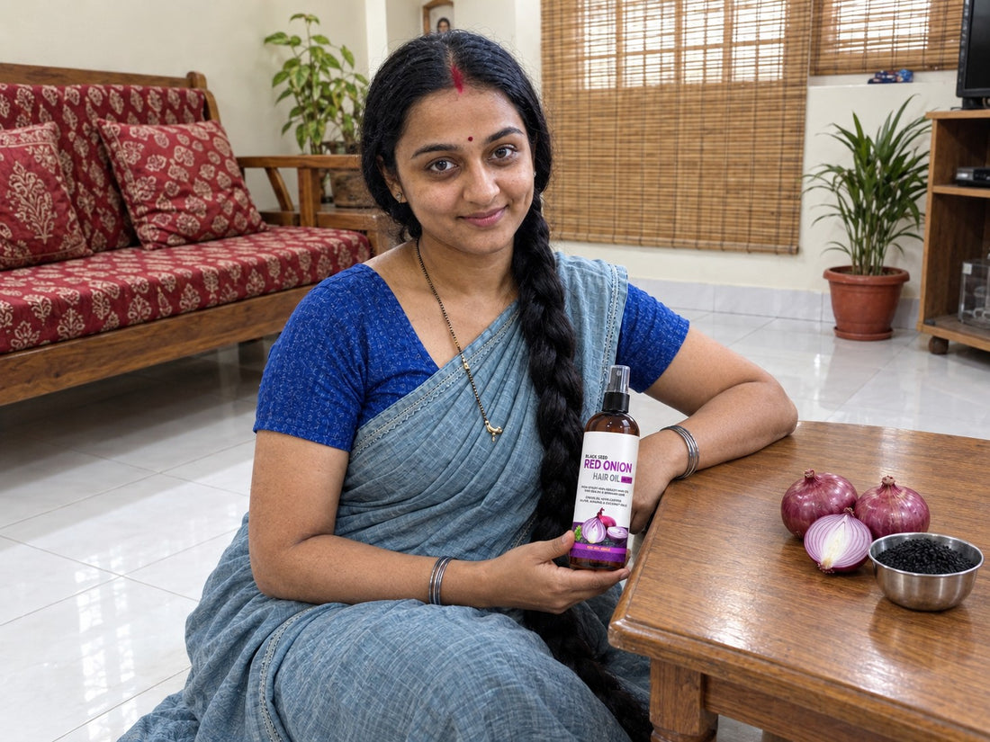 Black Seed Red Onion Hair Oil – held by our founder Meera at home