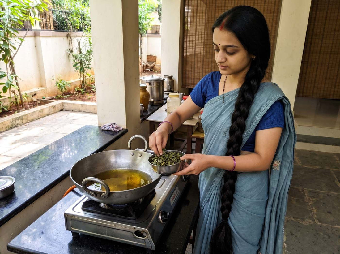Alakini Herbal Hair Oil – Meera slow-warming the herbs in oil